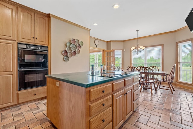 kitchen with crown molding, electric cooktop, an inviting chandelier, stone tile flooring, and dobule oven black