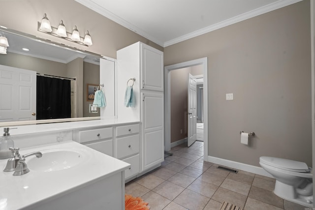 bathroom featuring baseboards, visible vents, tile patterned flooring, crown molding, and toilet