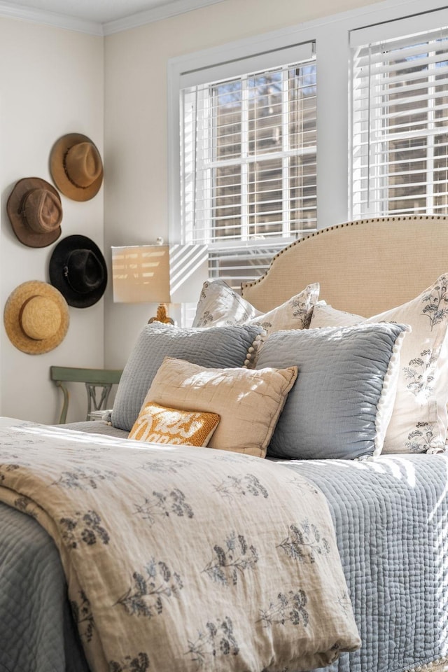 bedroom featuring crown molding