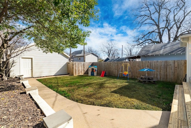 view of yard with a fenced backyard