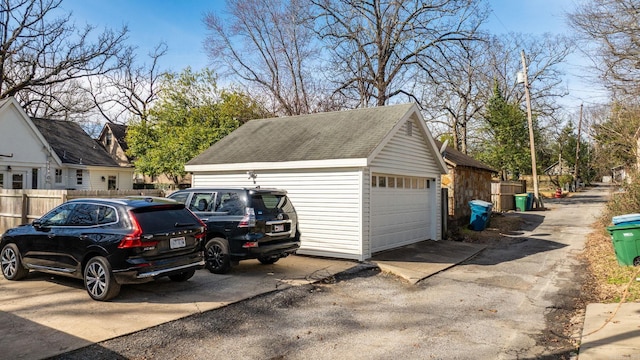 detached garage with fence