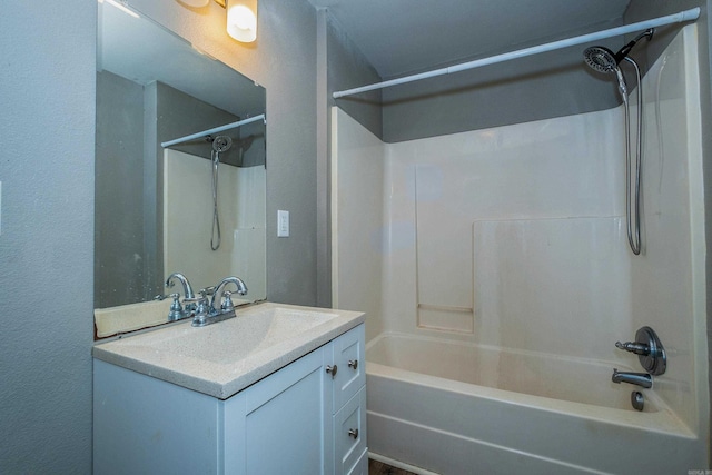 bathroom featuring vanity and shower / tub combination