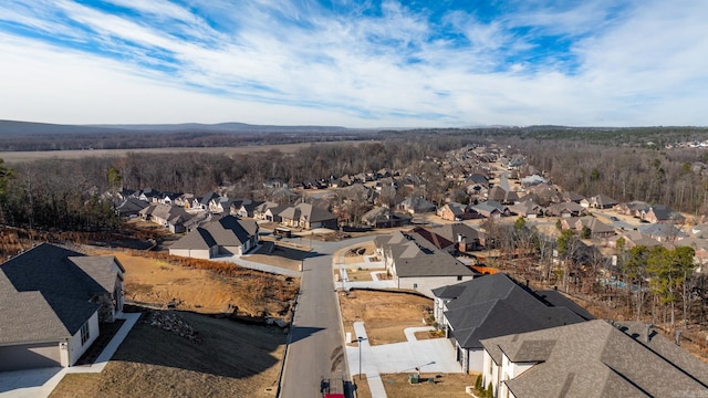 birds eye view of property with a residential view