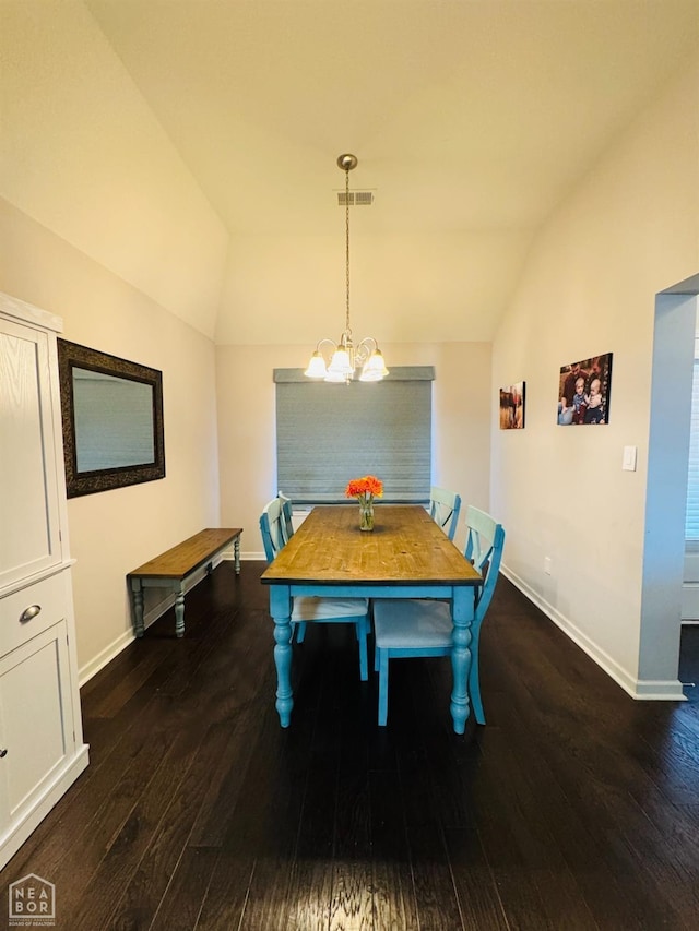 dining space featuring visible vents, baseboards, a chandelier, vaulted ceiling, and dark wood-style floors