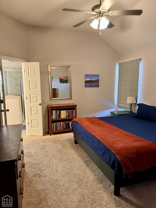 carpeted bedroom featuring lofted ceiling and a ceiling fan