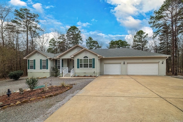 ranch-style house with crawl space, driveway, a garage, and roof with shingles