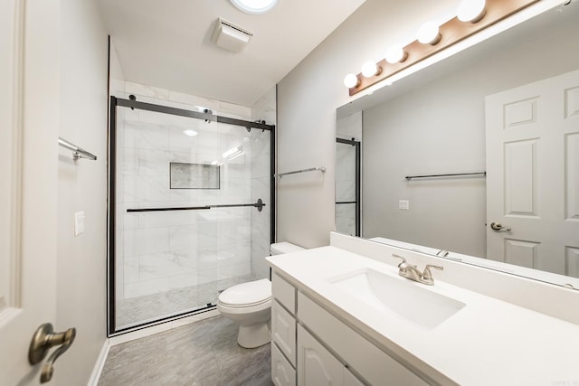 full bath with visible vents, a shower stall, toilet, and vanity