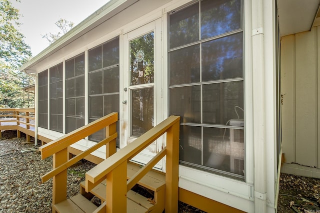 exterior space featuring a sunroom