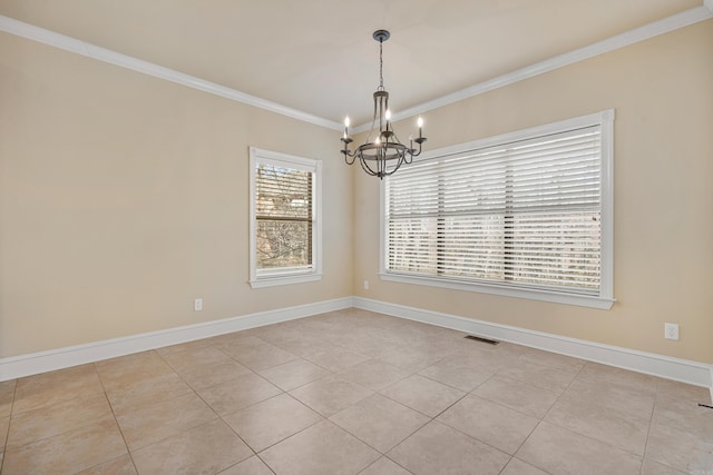 empty room with visible vents, an inviting chandelier, crown molding, light tile patterned floors, and baseboards