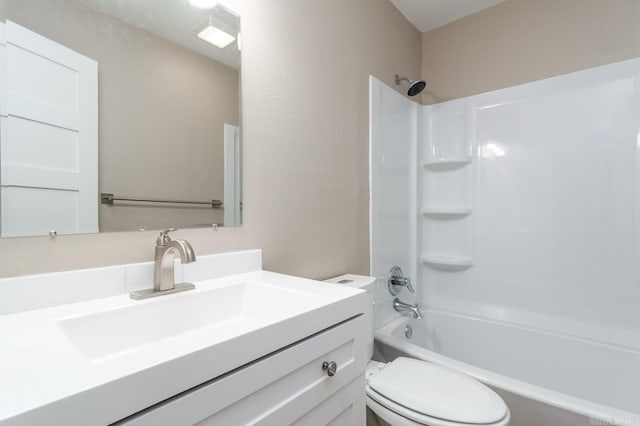 full bath with vanity, toilet, and bathing tub / shower combination