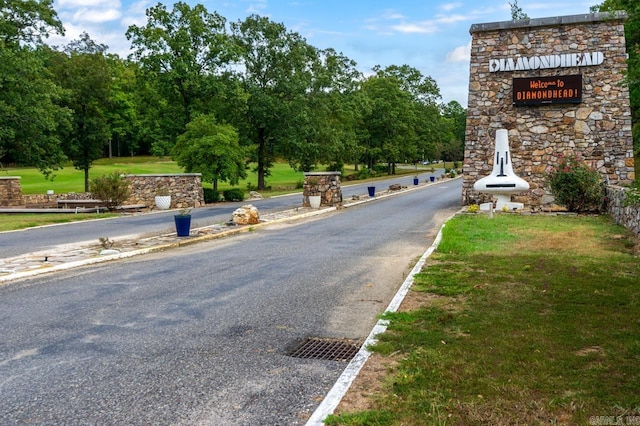 view of street featuring curbs
