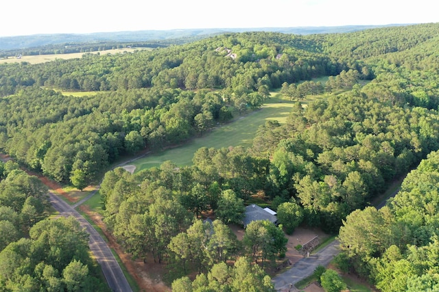 drone / aerial view with a view of trees