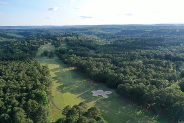 birds eye view of property with a wooded view