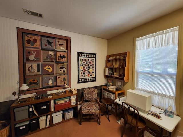 living area featuring visible vents