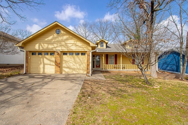 single story home featuring brick siding, a porch, concrete driveway, and a garage