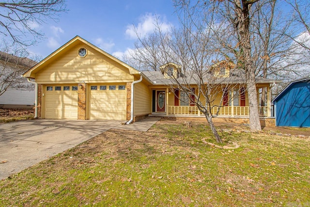 ranch-style home featuring an attached garage, brick siding, covered porch, and driveway