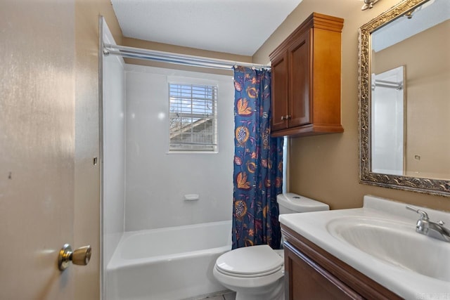 bathroom featuring shower / bath combo with shower curtain, toilet, and vanity