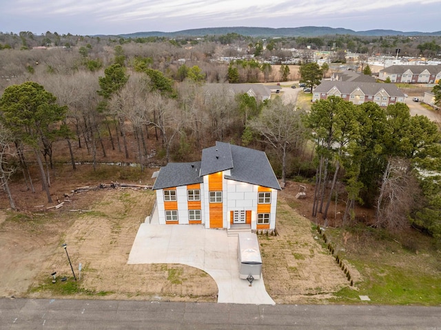 birds eye view of property with a residential view