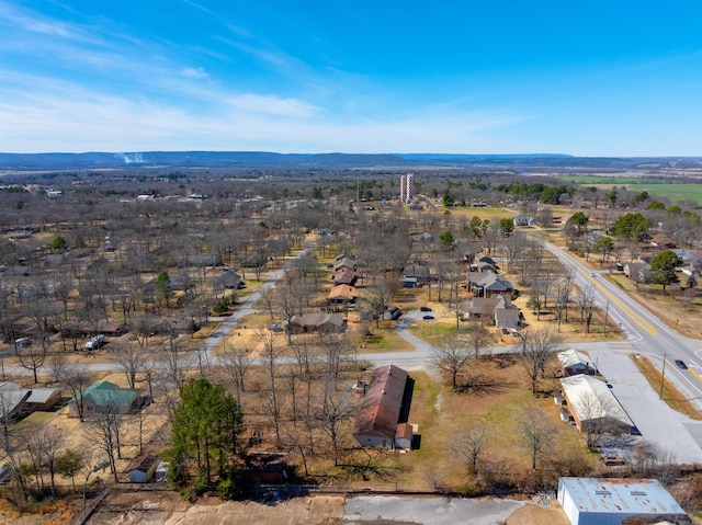 birds eye view of property with a mountain view