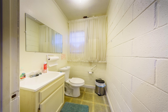 half bathroom with vanity and toilet