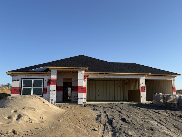 property under construction featuring a garage