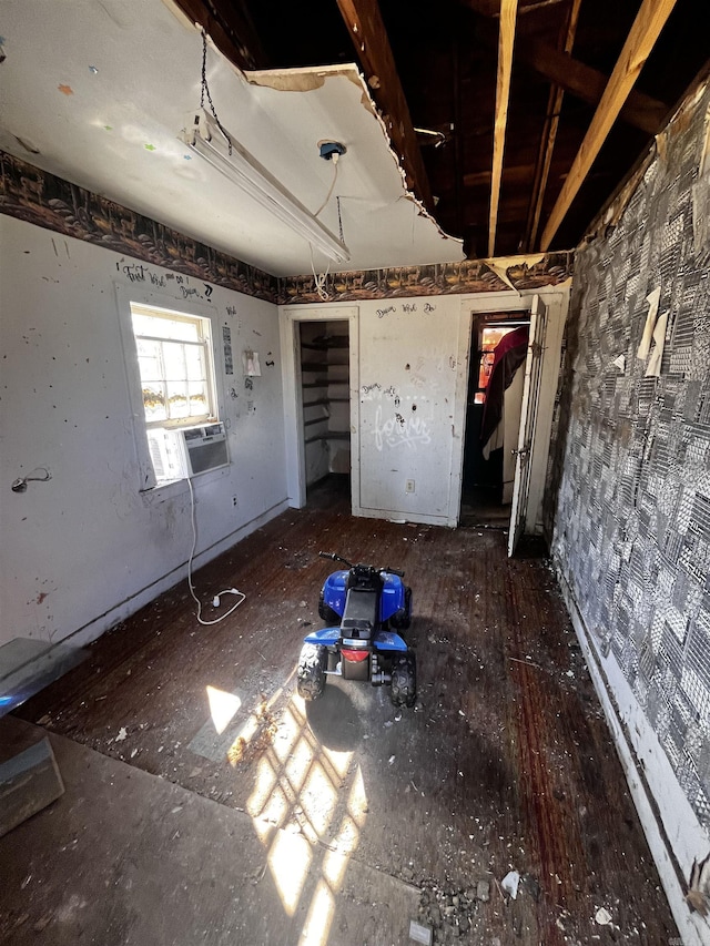 unfurnished bedroom featuring cooling unit