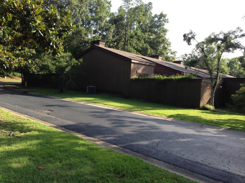 view of road featuring curbs