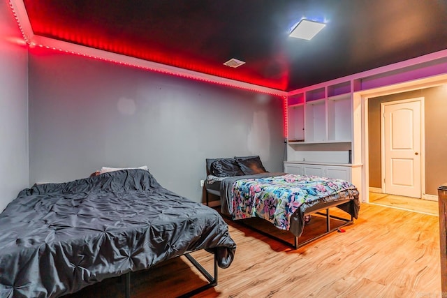 bedroom with light wood-style floors