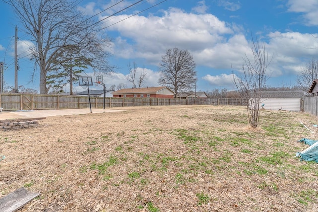 view of yard featuring a fenced backyard and a patio area