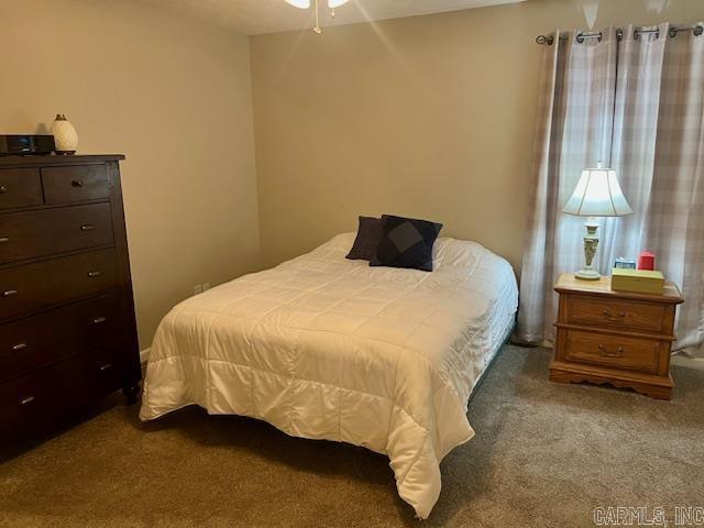 bedroom featuring carpet