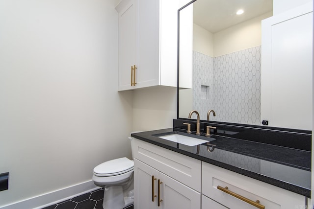 115 Fletcher Ridge Dr, Little Rock, AR 72223 - bathroom featuring tile patterned flooring, toilet, vanity, and baseboards