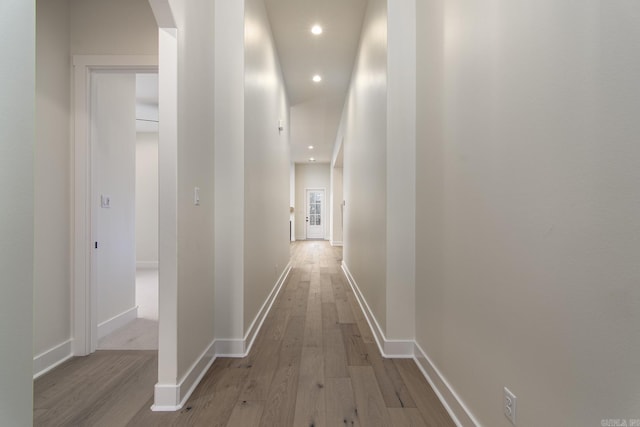 115 Fletcher Ridge Dr, Little Rock, AR 72223 - hallway with recessed lighting, baseboards, arched walkways, and wood finished floors