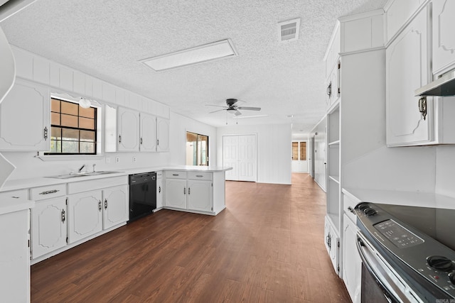 kitchen featuring visible vents, a peninsula, a sink, stainless steel range with electric stovetop, and dishwasher