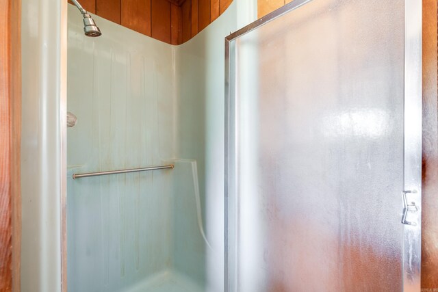 full bath featuring a stall shower