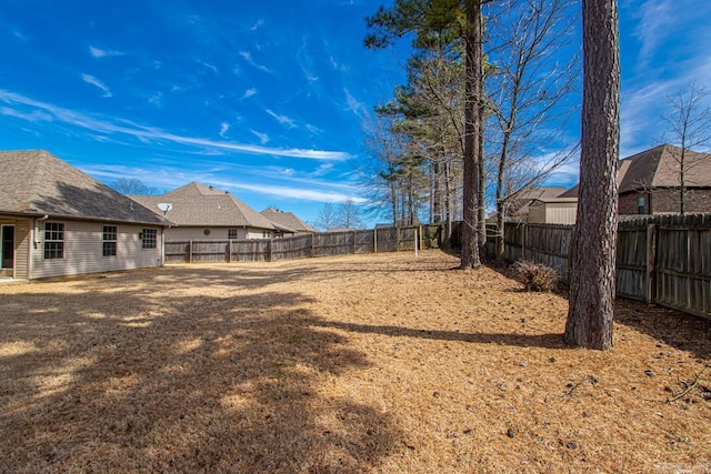 view of yard featuring a fenced backyard