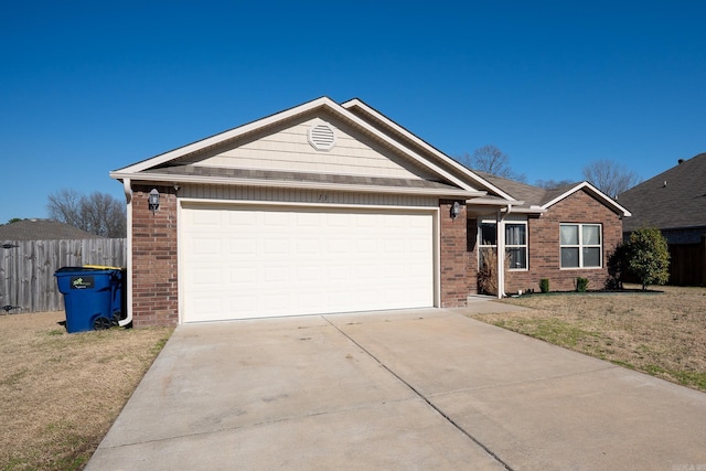 single story home featuring fence, driveway, a front lawn, a garage, and brick siding