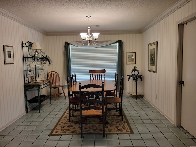 dining area with a notable chandelier, light tile patterned flooring, visible vents, and a textured ceiling