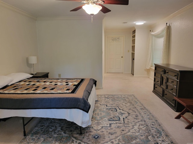 bedroom with ceiling fan, crown molding, baseboards, and light carpet