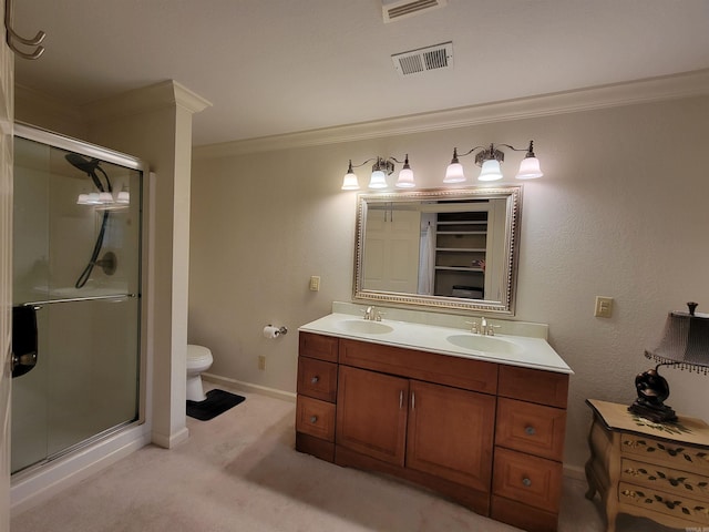 bathroom with a sink, visible vents, a stall shower, and crown molding