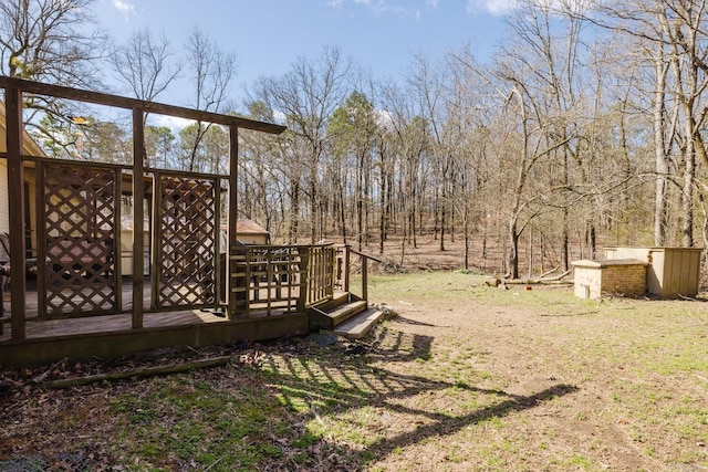 view of yard with a deck