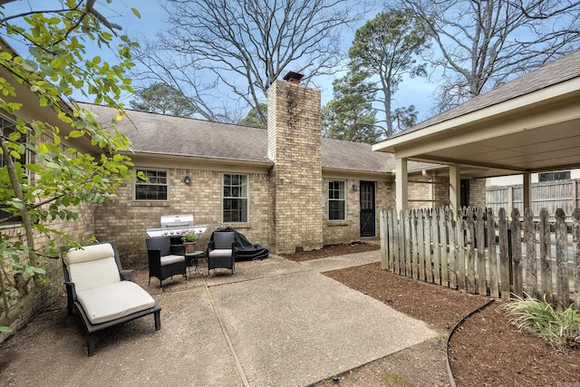 view of patio / terrace with fence