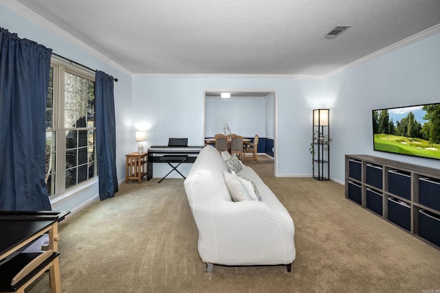 carpeted living room with crown molding, baseboards, visible vents, and a textured ceiling