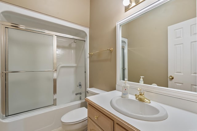 full bath featuring vanity, toilet, and enclosed tub / shower combo