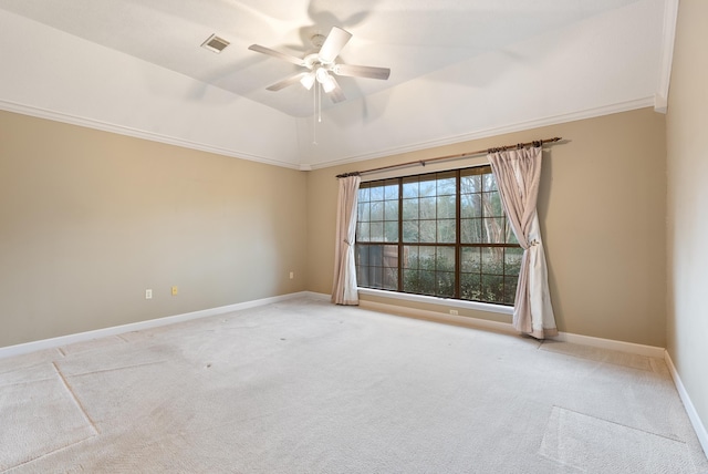 unfurnished room featuring visible vents, crown molding, ceiling fan, baseboards, and light carpet