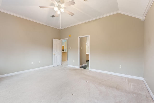 spare room with baseboards, crown molding, and ceiling fan