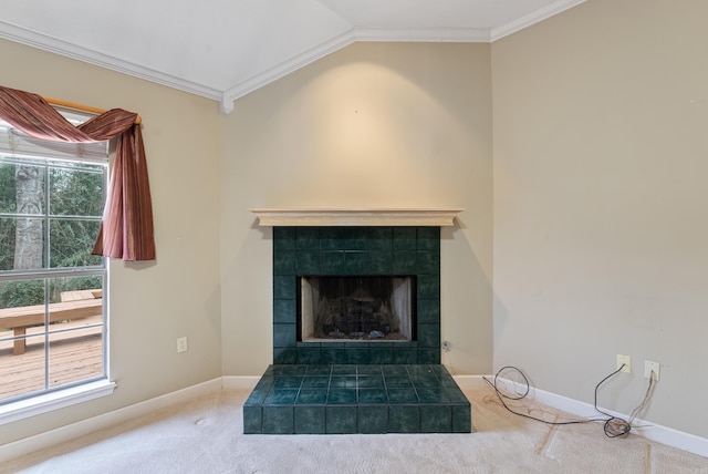 interior details featuring baseboards, a fireplace, ornamental molding, and carpet flooring