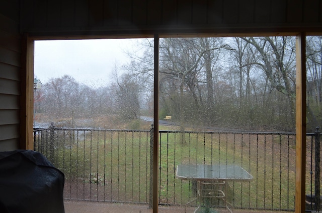 unfurnished sunroom featuring plenty of natural light