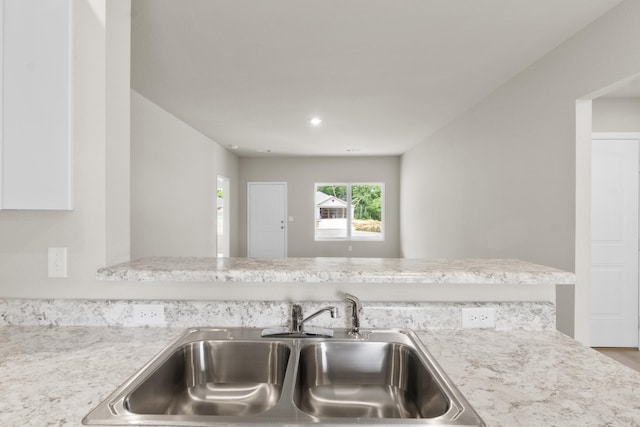 16 Sig Cv, Ward, AR 72176 - kitchen featuring a sink, light countertops, and recessed lighting