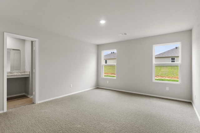 16 Sig Cv, Ward, AR 72176 - unfurnished bedroom featuring carpet floors, baseboards, and ensuite bath