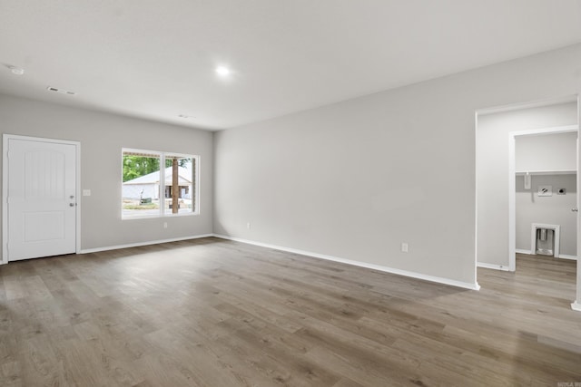 16 Sig Cv, Ward, AR 72176 - empty room with wood finished floors and baseboards